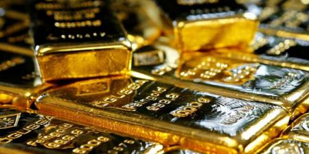 الذهب ينخفض لأدنى مستوى في شهر مع تقلص المخاطر التجارية