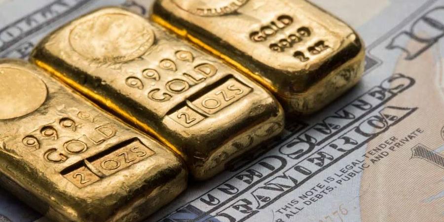 الذهب يهبط بنسبة 2.9% وسط تفاؤل تجاري وارتفاع للدولار